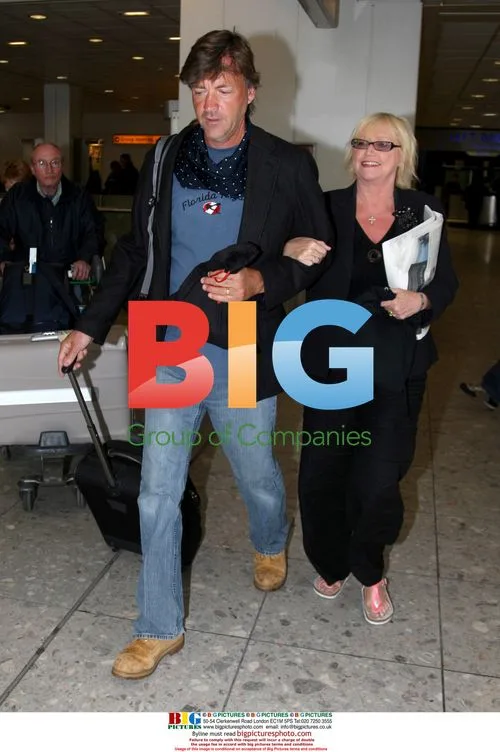 Richard Madeley and Judith Finnigan Arrive at Heathrow