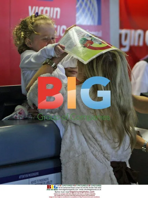 Geri Halliwell and Daughter Bluebell Madonna at LAX