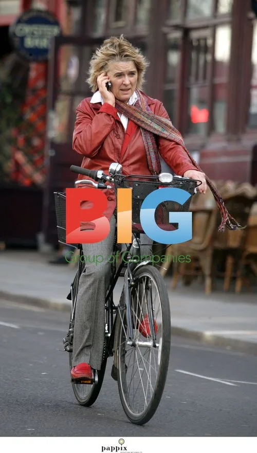Actress Sinead Cusack on Bicycle in London