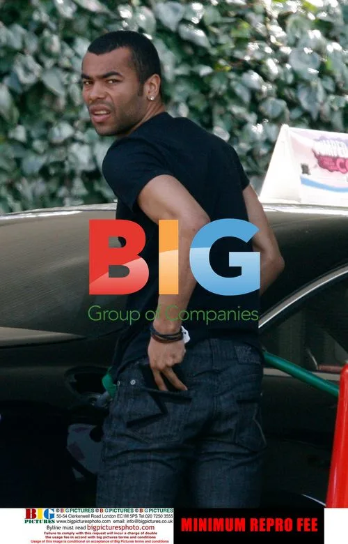 Ashley Cole leaving petrol station without wedding ring