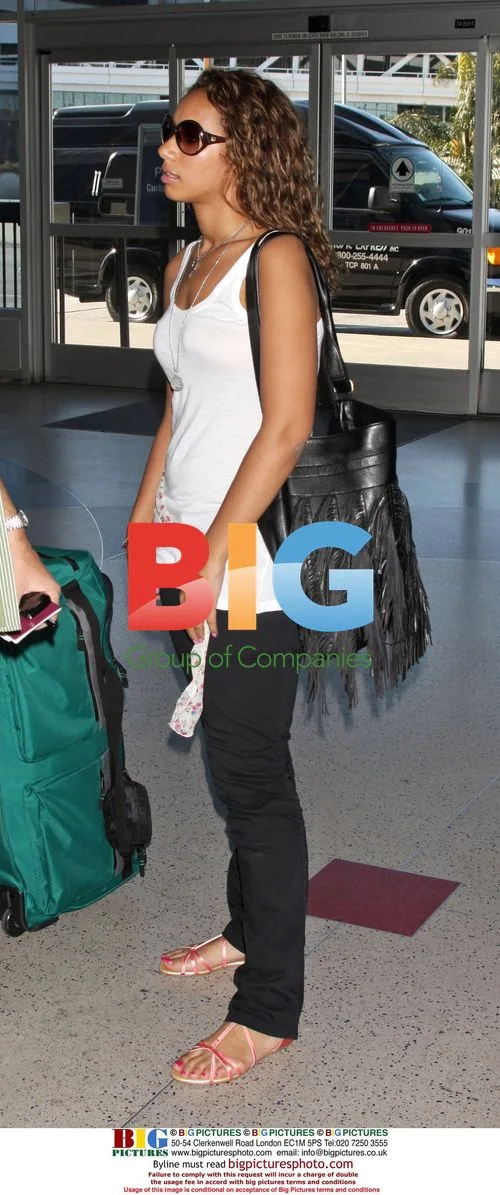 Leona Lewis and Lou Al-Chamaa Depart LAX