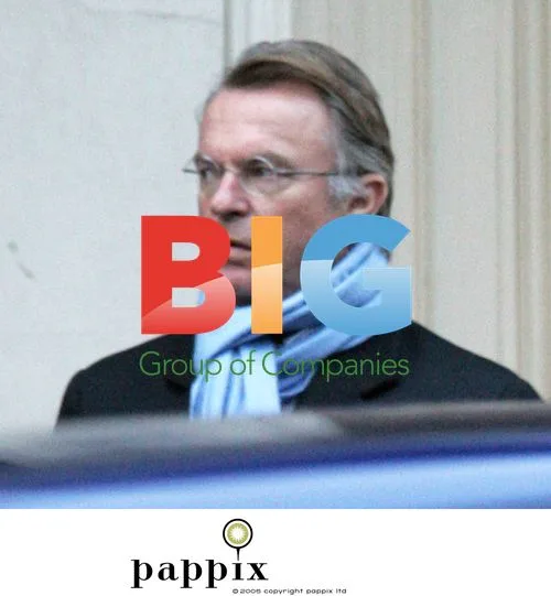 Sam Neill and wife wait for cab