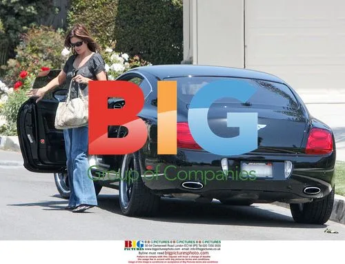 Cindy Crawford and Rande Gerber exit SoCal home