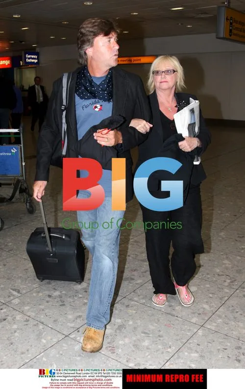 Richard Madeley and Judith Finnigan at Heathrow