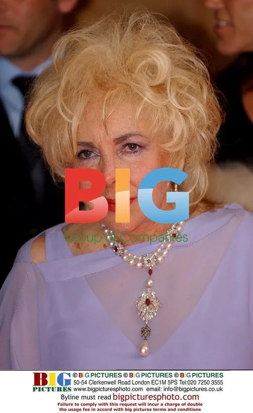 Dame Elizabeth Taylor Arriving at Cannes Film Festival