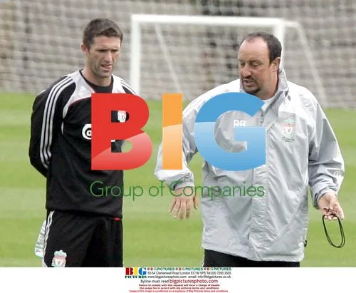 Robbie Keane practices with Liverpool