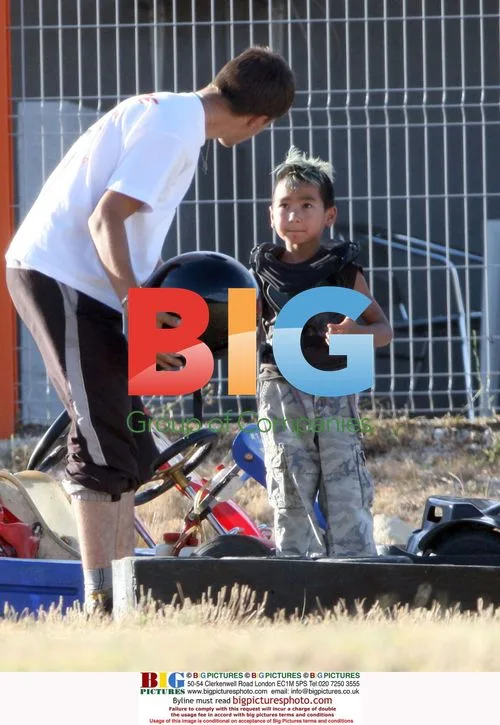 Brad Pitt and son Maddox go karting