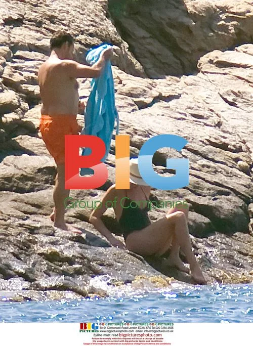 Nicolas and Carla Sarkozy Swimming