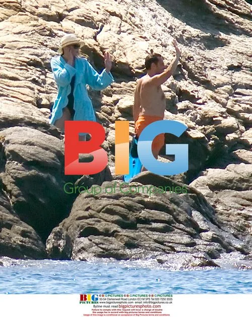 Nicolas and Carla Sarkozy at Beach