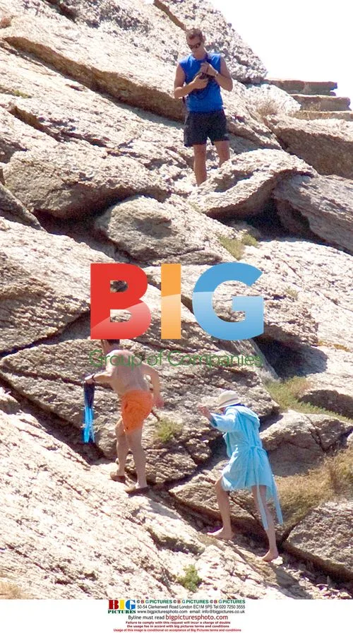 Nicolas and Carla Sarkozy at the beach