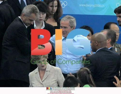 Bush Slips on Way to Olympics Seat