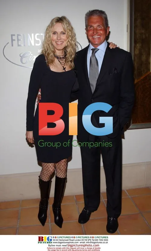 Alana Stewart & George Hamilton at Finestein's Party