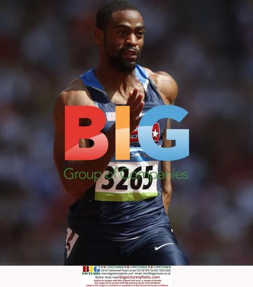 Tyson Gay wins 100m heat at Beijing Olympics