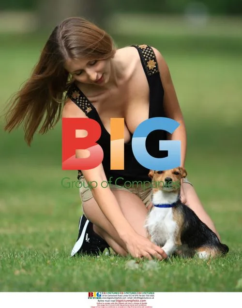 Claudia Ciesla Takes Dog for Walk in Hyde Park
