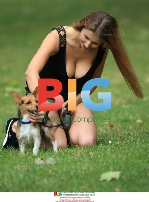 Claudia Ciesla Walks Dog in Hyde Park