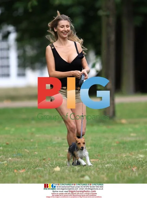 Claudia Ciesla takes dog for walk in London