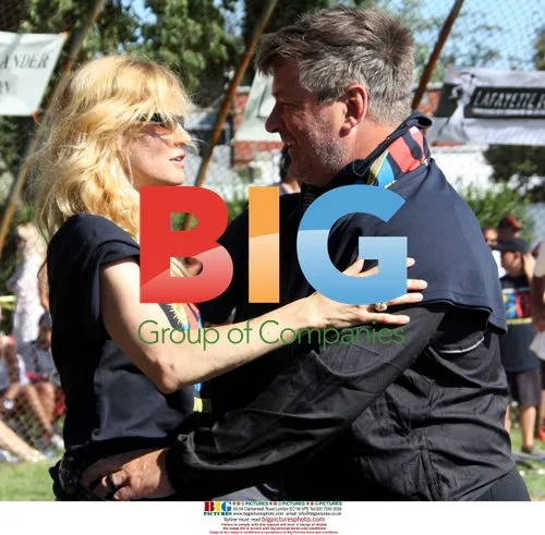 Lori Singer and Alec Baldwin at Charity Softball Game