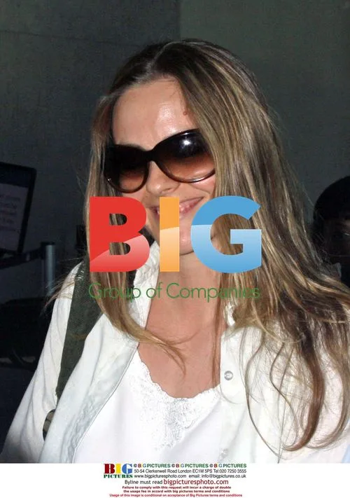 Alicia Silverstone Departs LAX