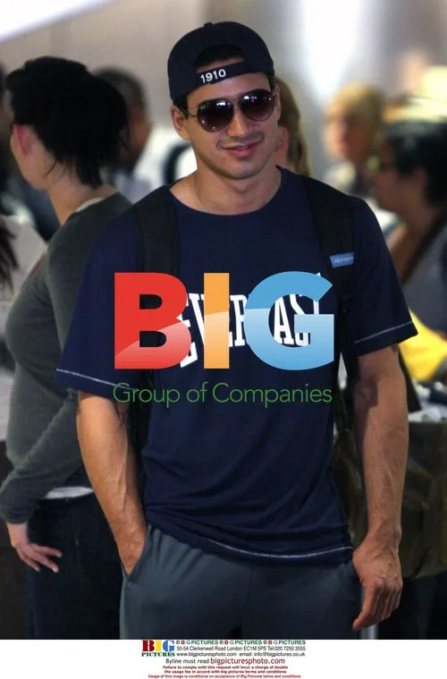 Cheerful Mario Lopez at LAX