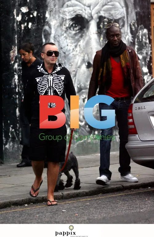 Designer Julian MacDonald out with boyfriend and dog