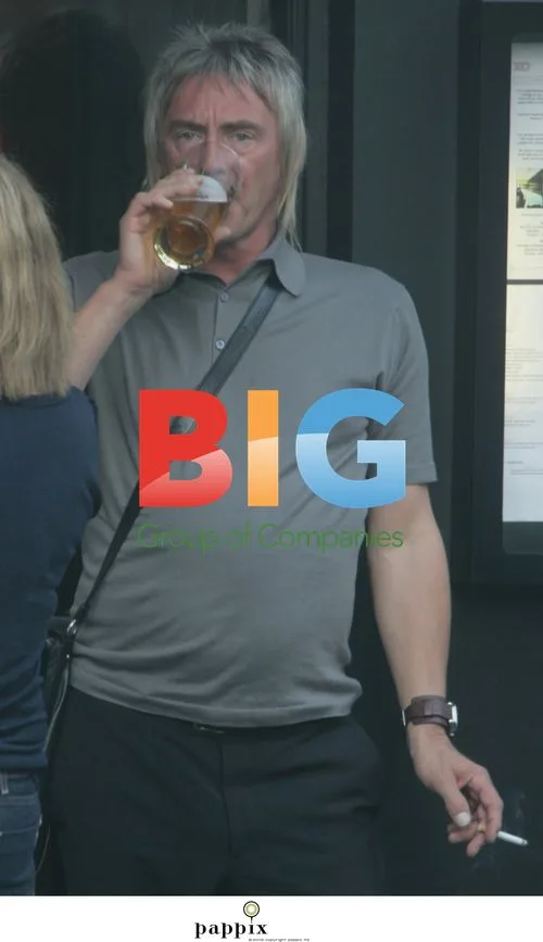 Paul Weller takes a pub break in London