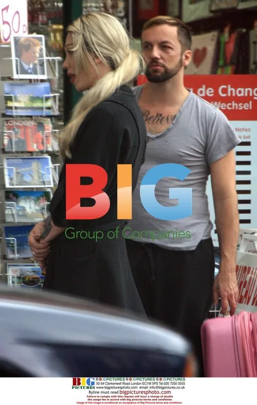 Pete Burns and Michael Simpson shopping in London