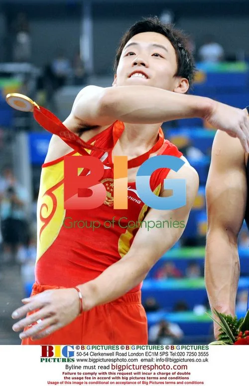 China's Zou Kai wins gold in horizontal bar