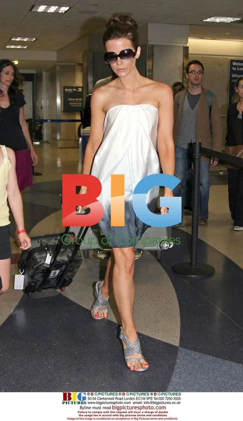 Kate Beckinsale, Len Wiseman, and daughter Lily Sheen at LAX