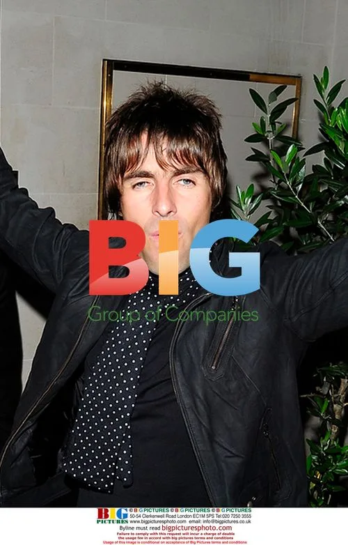 Liam Gallagher Leaves Scotts with Wife