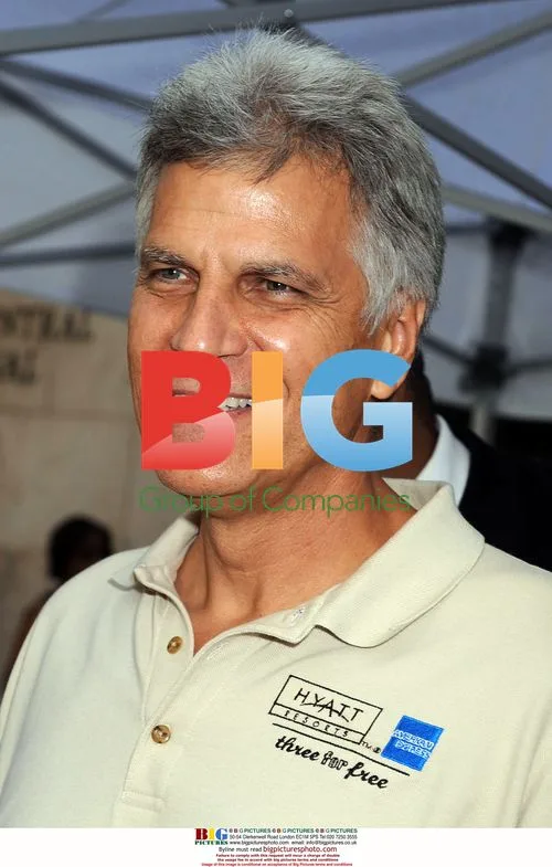 Mark Spitz holds Phelps Sports Illustrated cover