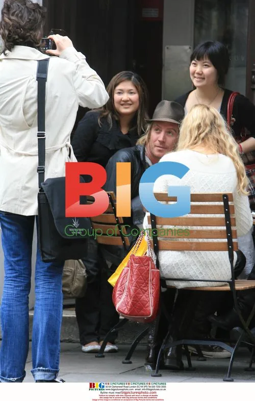 Kimberly Stewart and Rhys Ifans out in London