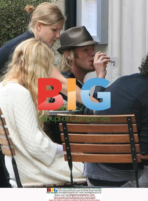 Kimberly Stewart and Rhys Ifans enjoy lunch in London