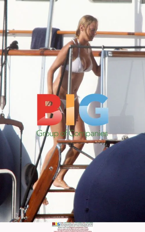 Uma Thurman, Arpad Busson, Liam Neeson on Italian Yacht
