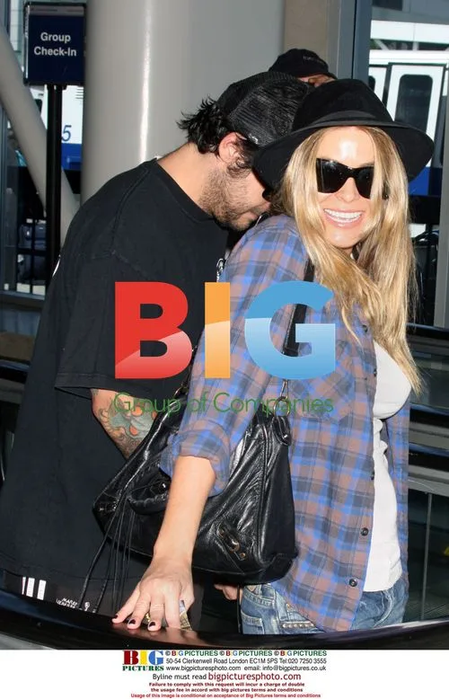 Carmen Electra and Rob Patterson Depart LAX
