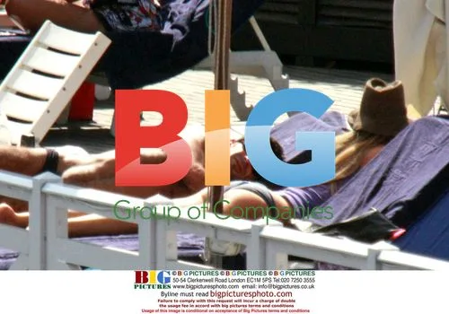 Portuguese footballer Lus Figo and family on holiday