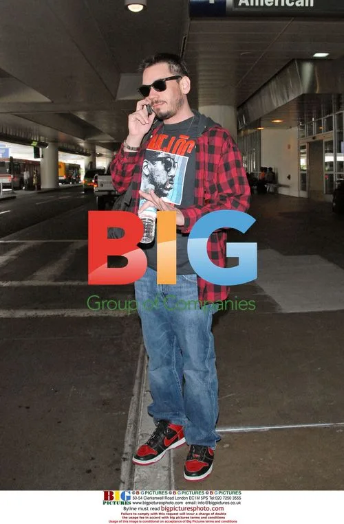 DJ AM arrives at LAX