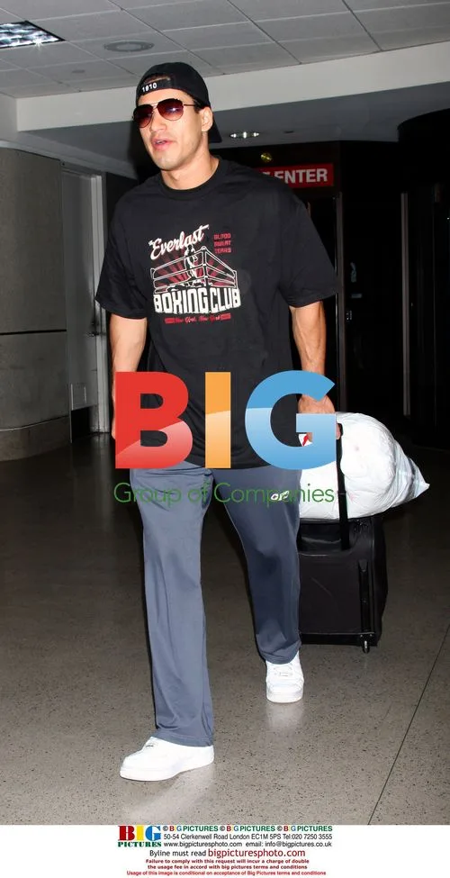 Mario Lopez arrives at LAX with luggage