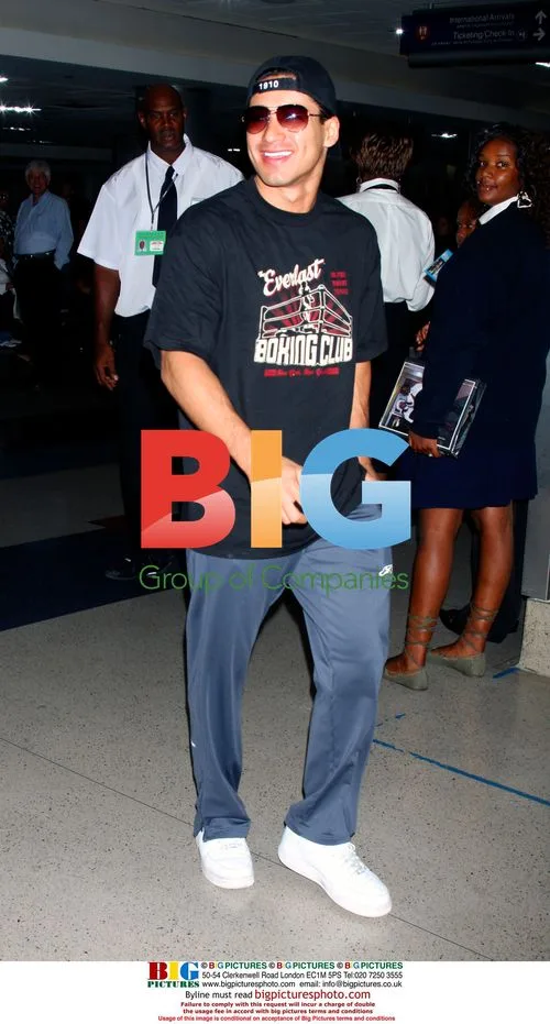 Mario Lopez arrives at LAX with luggage