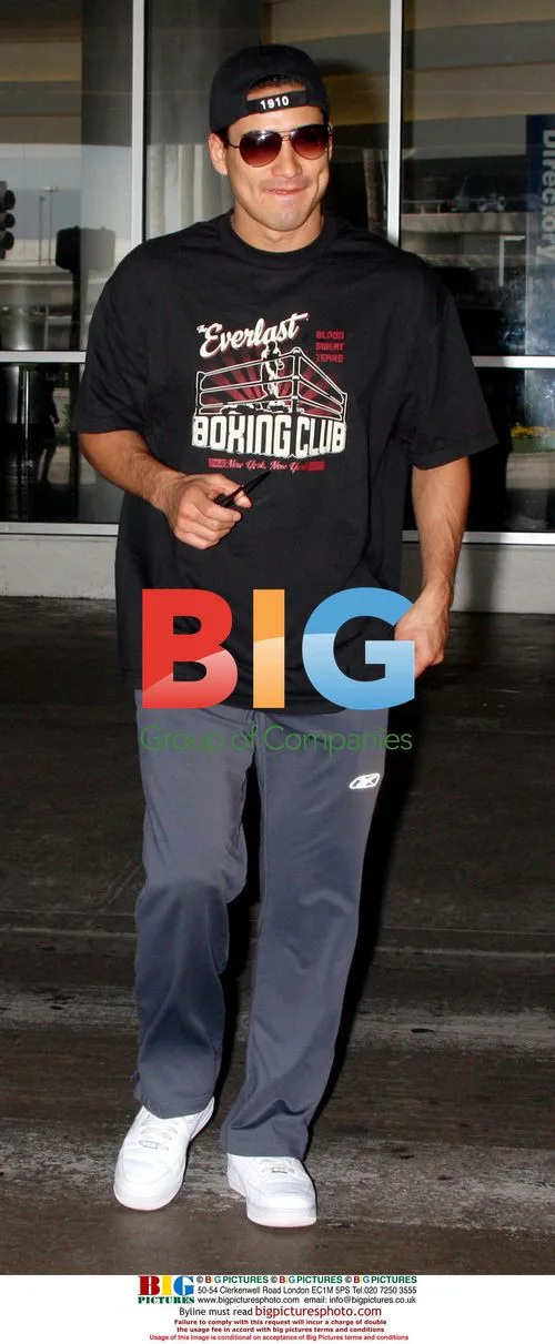 Mario Lopez arrives at LAX with luggage