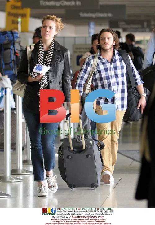 Mandy Moore and mystery man depart LAX