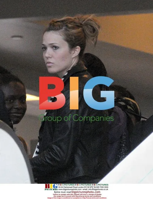 Mandy Moore and mystery man depart LAX