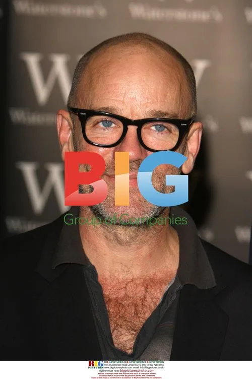 R.E.M. frontman Michael Stipe and photographer David Belisle sign books