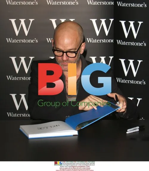 R.E.M. Stipe and Belisle Signing Books