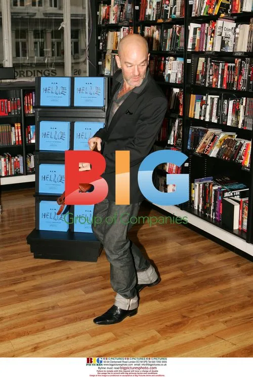 Michael Stipe and David Belisle sign R.E.M. book