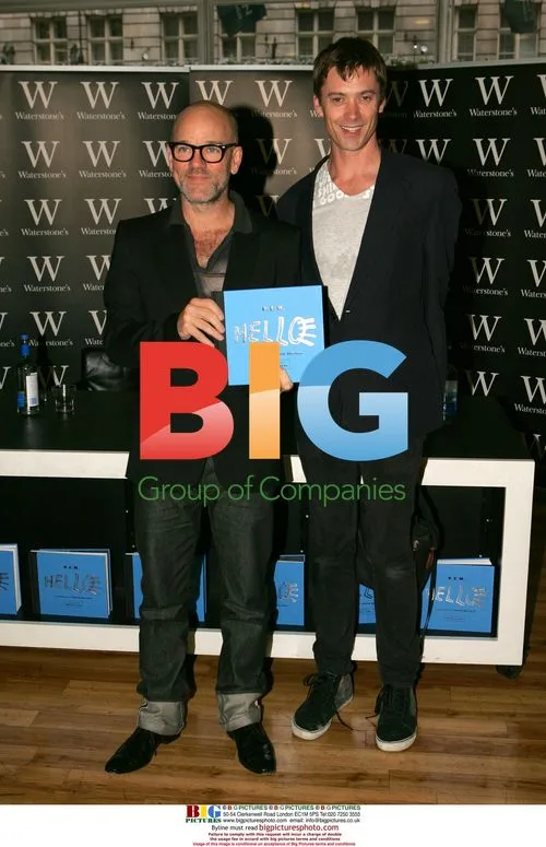 R.E.M. members sign book at Waterstones