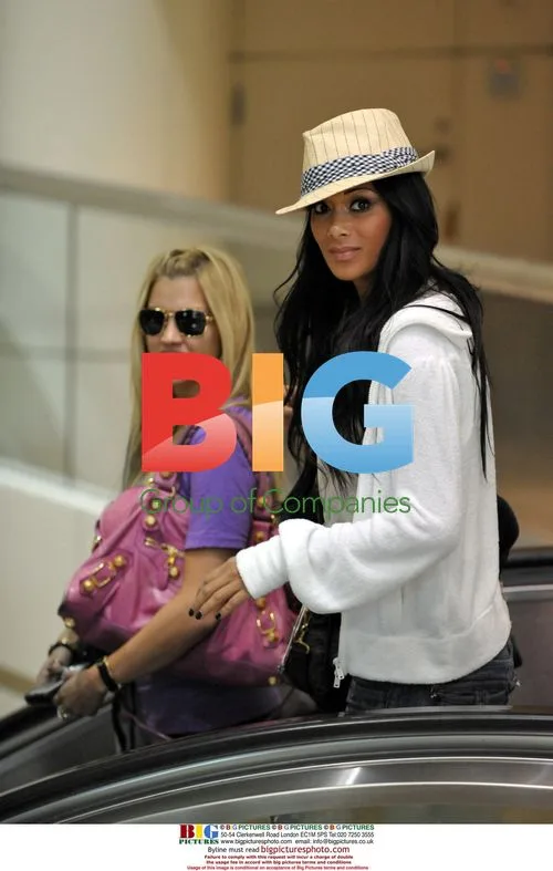 The Pussycat Dolls Arrive at LAX