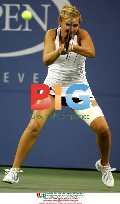 Timea Bacsinszky returns ball to Dinara Safina at U.S. Open