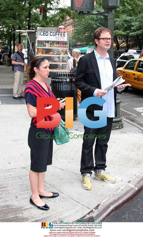 Rainn Wilson strolls with companion
