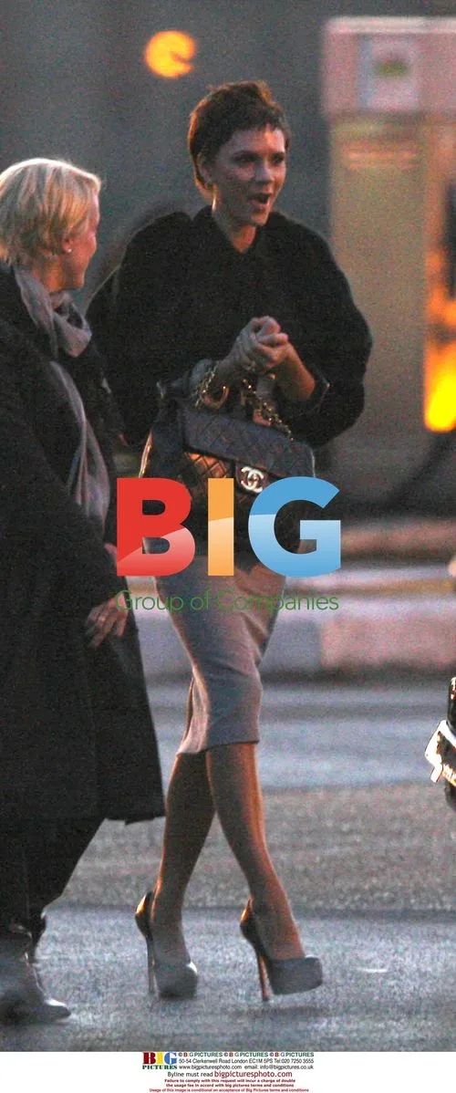 Victoria Beckham Flies into London Heliport