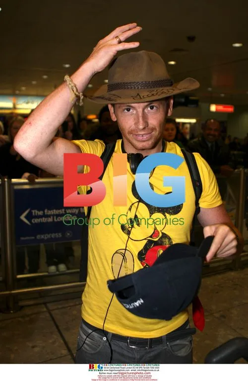 Joe Swash Arrives at Heathrow